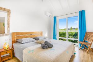 Postel nebo postele na pokoji v ubytování Kakina Lodges Jan Thiel + 31 fotografií