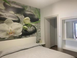 A bed or beds in a room at Casa Sole Mare