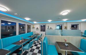 מסעדה או מקום אחר לאכול בו ב-Bernstein Hotel "50`s Seaside Motel"