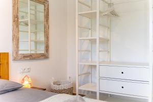 Ένα ή περισσότερα κρεβάτια σε δωμάτιο στο Kakina Lodges Jan Thiel