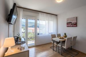 TV a/nebo společenská místnost v ubytování Apartment Orco