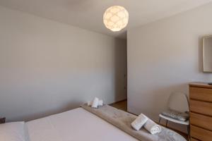 Postel nebo postele na pokoji v ubytování Apartment Orco