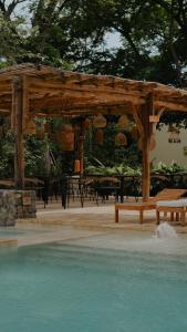 Πισίνα στο ή κοντά στο Nativa Refugio Escondido