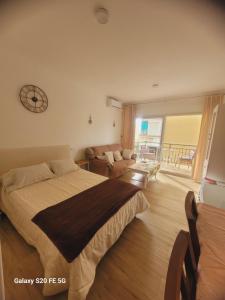 Ένα ή περισσότερα κρεβάτια σε δωμάτιο στο Apartamento manantiales