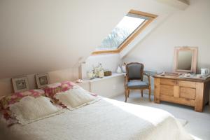Postel nebo postele na pokoji v ubytování Villa Flore Chambres d'Hotes