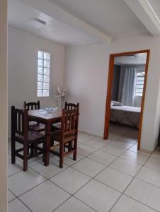 Postel nebo postele na pokoji v ubytování Casa próximo quartel Boqueirão
