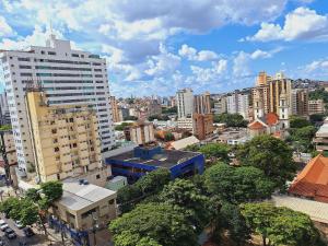 a view of a city with buildings and trees at LK Barro Preto 11 in Belo Horizonte