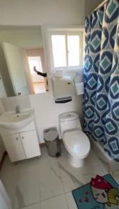 Koupelna v ubytování Cabaña H & M + 2 fotografie