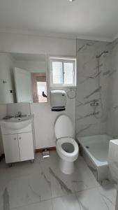 Koupelna v ubytování Cabaña H & M