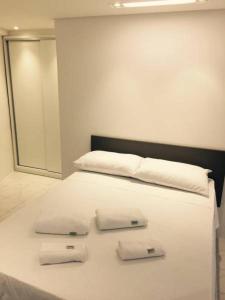 Cama ou camas em um quarto em Flat Jaqueira Experience