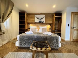 Łóżko lub łóżka w pokoju w obiekcie Villa Forêt et Spa