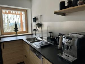 Kuchnia lub aneks kuchenny w obiekcie Villa Forêt et Spa