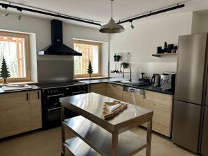 Kuchnia lub aneks kuchenny w obiekcie Villa Forêt et Spa