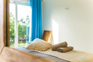 Ένα ή περισσότερα κρεβάτια σε δωμάτιο στο Kakina Lodges Jan Thiel