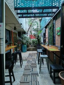 Restaurace v ubytování Canela Hostel Medellin + 14 fotografií