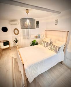 Posteľ alebo postele v izbe v ubytovaní Cosy Studio +netflix+24h entry+silent air conditionning