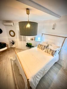 Posteľ alebo postele v izbe v ubytovaní Cosy Studio +netflix+24h entry+silent air conditionning