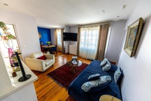 Μια τηλεόραση ή/και κέντρο ψυχαγωγίας στο Maison de ville vue port