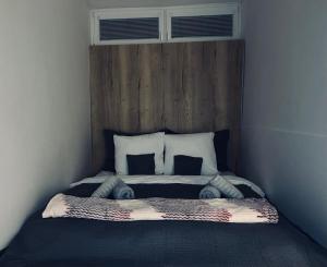 Ένα ή περισσότερα κρεβάτια σε δωμάτιο στο FriendlyChill-ZonePlace +11 φωτογραφίες