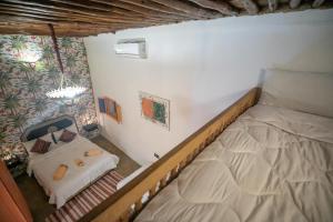 Postel nebo postele na pokoji v ubytování Riad bab merzouga