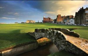 a stone bridge over a river next to a golf course at THE COASTAL INN ACCOMMODATIONs in Cellardyke
