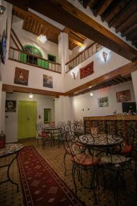 Posezení v ubytování Riad bab merzouga