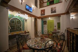 Posezení v ubytování Riad bab merzouga