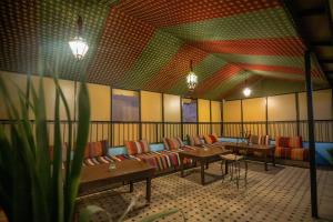 Posezení v ubytování Riad bab merzouga