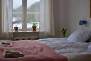 Letto o letti in una camera di Osaby Säteri