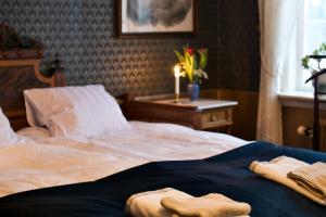 Letto o letti in una camera di Osaby Säteri
