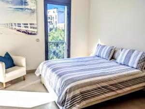 Posteľ alebo postele v izbe v ubytovaní Spacious apartment with 3 pools & gym