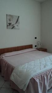 Voodi või voodid majutusasutuse Hotel Cinzia toas
