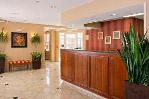a lobby with a bar in a hospital at Residence Inn Kansas City Olathe in Olathe