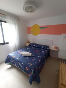 Ένα ή περισσότερα κρεβάτια σε δωμάτιο στο Apartamento Cactus
