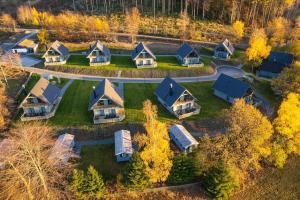 an aerial view of a group of homes at Lodge in Buntenbock in Flussnähe in Clausthal-Zellerfeld
