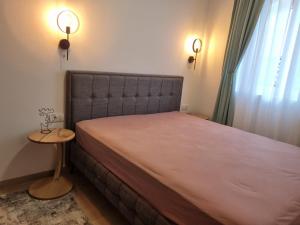 Postel nebo postele na pokoji v ubytování Wolf Apartments SPA Kopaonik + 47 fotografií