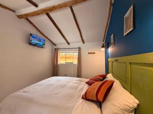 Letto o letti in una camera di Anido Hotel