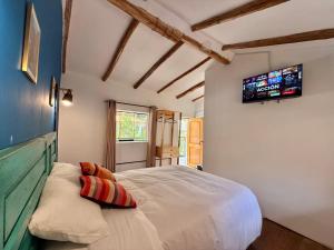 Letto o letti in una camera di Anido Hotel