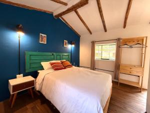 Letto o letti in una camera di Anido Hotel