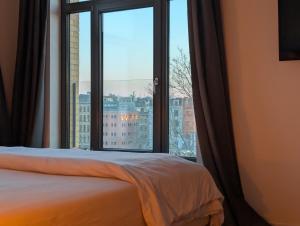 Voodi või voodid majutusasutuse Luxury Duplex Suite 2-Story toas
