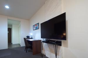 TV a/nebo společenská místnost v ubytování Hotel Tohkai