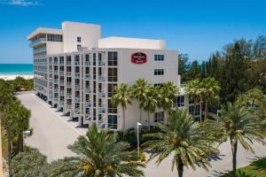 an aerial view of the resort with palm trees at Residence Inn by Marriott St. Petersburg Treasure Island in St Pete Beach