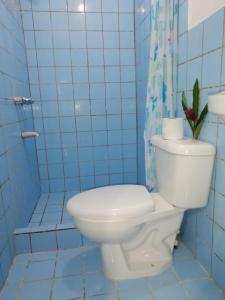 Koupelna v ubytování Amapola Rooms + 36 fotografií