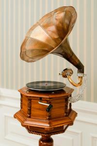 a shoe on top of a wooden table at Hotel Bristol, A Luxury Collection Hotel, Warsaw in Warsaw