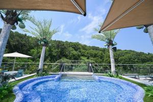 Bazén v ubytování Hotel Susung Spa Resort nebo v jeho okolí