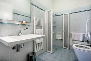 Koupelna v ubytování Hotel Il Cavallo + 17 fotografií