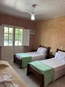 Katil atau katil-katil dalam bilik di Pousada Canavieiras Frederic +18 gambar
