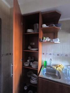 Una cocina o cocineta en Departamento comodo