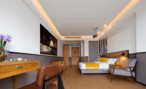 TV a/nebo společenská místnost v ubytování Anyuechengxiang Hotel