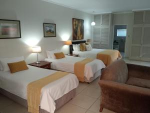 Postel nebo postele na pokoji v ubytování Harmony Place